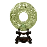 Carved jade disc